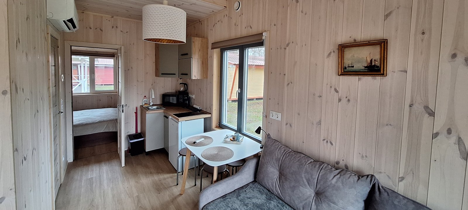 „Jūros glėbyje“ apartamentų interjeras